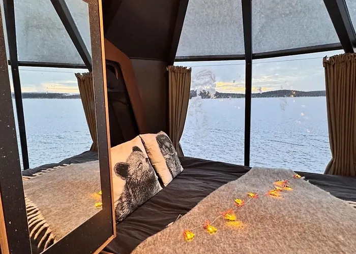 Unique Warm Glass Igloo On A Frozen In Ivalo *